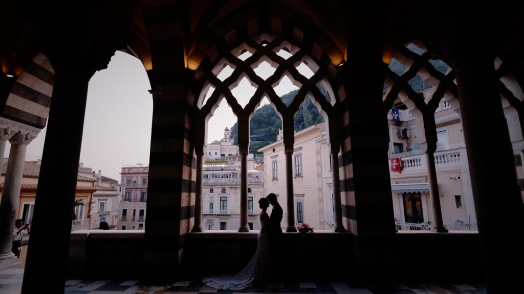 Couple walking through the historic streets of Amalfi